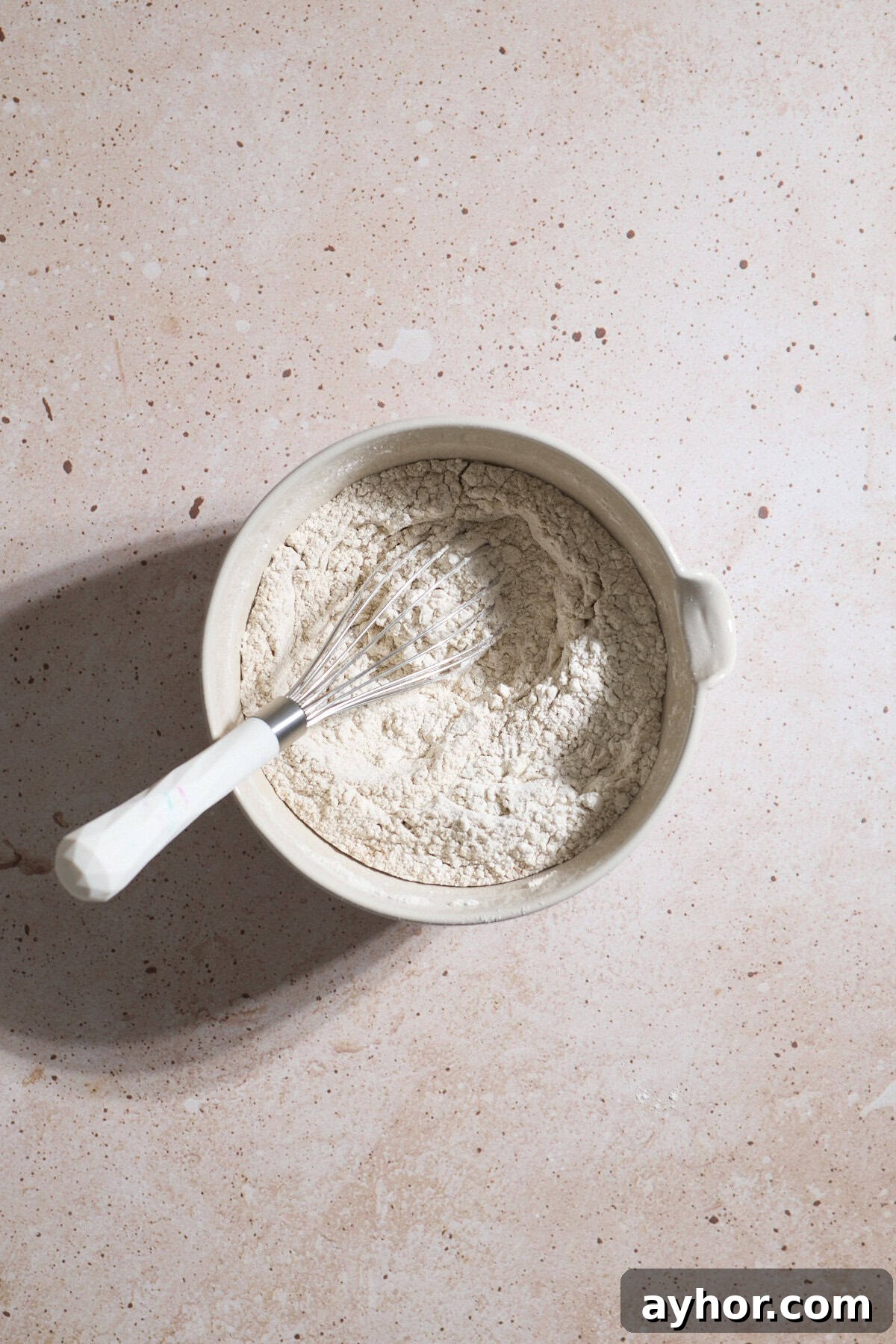Dry ingredients in a small mixing bowl.