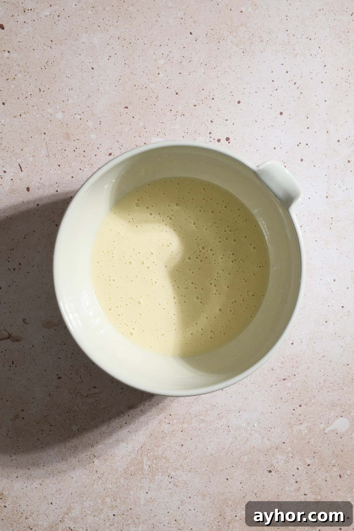 Wet ingredients in a large mixing bowl.